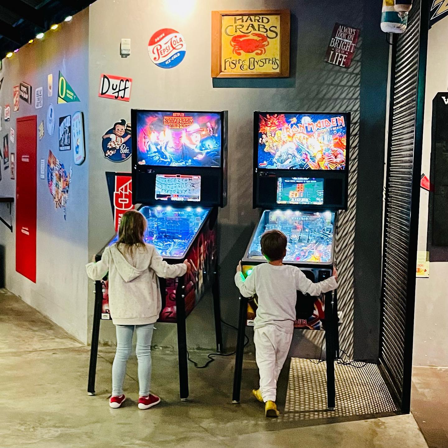 Pinball wizards at the “Claw BBQ Crab Shack & Dive Bar”