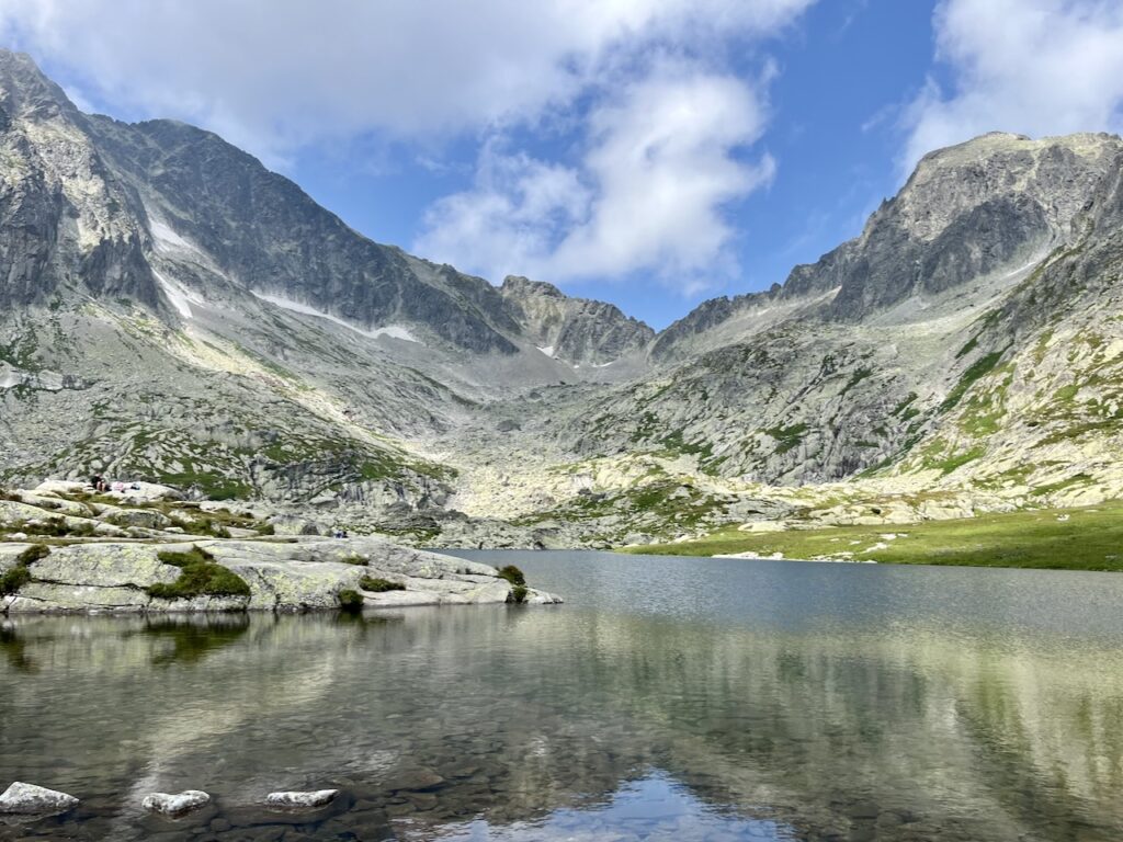 Moutain lake with moutains in background.